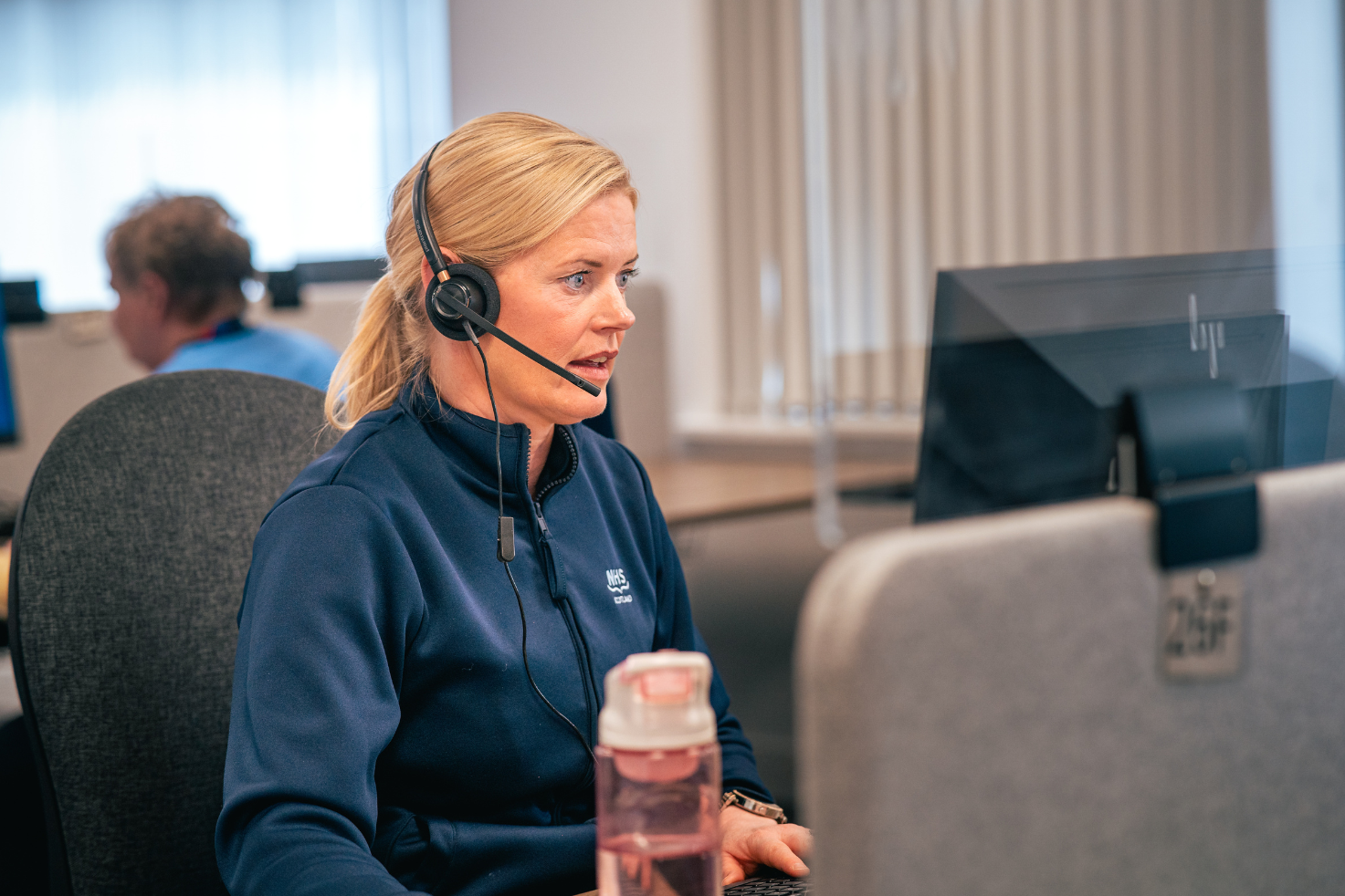 What is an NHS 24 call handler?