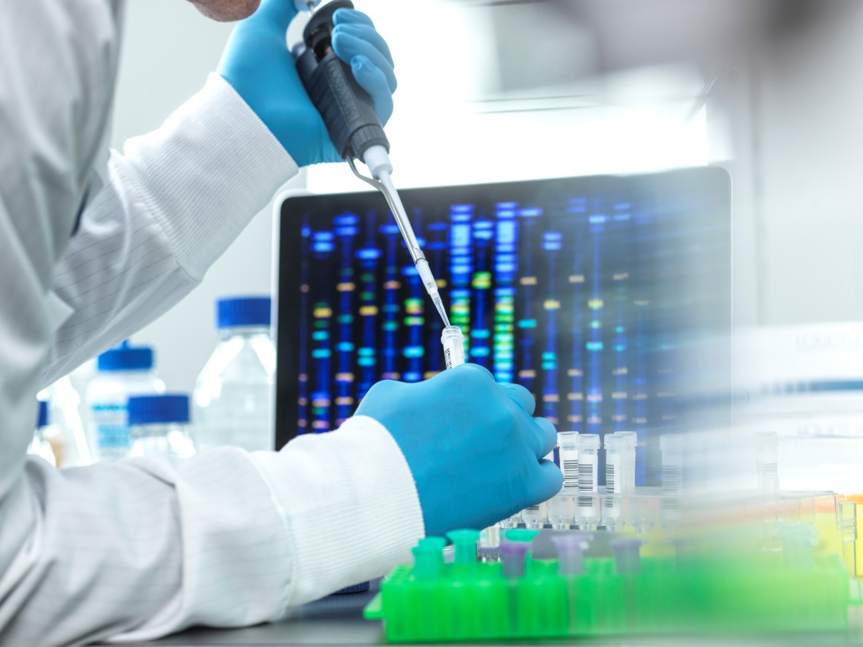 What is a clinical scientist in genetics and molecular pathology?